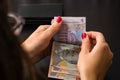 Woman counting LEI Romanian money