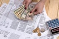 Woman counting money on the background