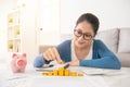 Woman counting money tower from savings Royalty Free Stock Photo