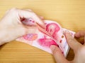 Woman counting stack of 100 yuan banknotes money Royalty Free Stock Photo