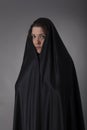 Woman covered with black veil Royalty Free Stock Photo