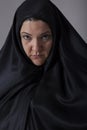 Woman covered with black veil Royalty Free Stock Photo