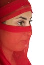 Woman covered in red kerchief