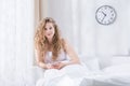 Woman covered by white duvet Royalty Free Stock Photo