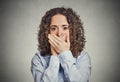 Woman covering closed mouth with hands. Speak no evil Royalty Free Stock Photo