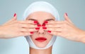 Beauty, Fashion and Plastic Surgery concept. Woman covering eyes with bandaged head Royalty Free Stock Photo