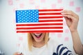 Woman covering her eyes with USA flag Royalty Free Stock Photo