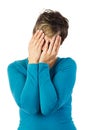 Woman covering her face with both hands Royalty Free Stock Photo