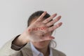 A woman covering her face Metoo hashtag word on palm of hand. Royalty Free Stock Photo