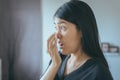 Woman covering mouth and smell her breath with hand after wake up,Bad smell Royalty Free Stock Photo