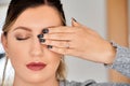 Woman covering one eye with her manicured hand Royalty Free Stock Photo