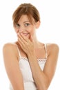 Woman covering teeth Royalty Free Stock Photo