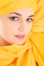 Woman covering with yellow cloth