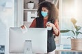 Woman, covid and spray for cleaning computer with face mask, workplace safety and liquid for healthcare. Professional Royalty Free Stock Photo