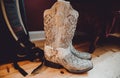 Woman cowboy leather boot. Royalty Free Stock Photo