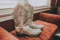 Woman cowboy leather boots. Royalty Free Stock Photo