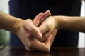 Woman cracking their knuckles