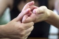 Woman cracking their knuckles