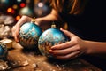 Woman crafting Christmas decorations close up