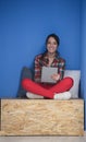 Woman in crative box working on tablet Royalty Free Stock Photo