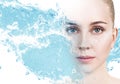 Woman with cream dots on face in blue water splash Royalty Free Stock Photo