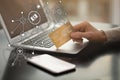 Woman with card using laptop for online payment at table, closeup Royalty Free Stock Photo