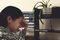 Woman cries at the computer, crisis Royalty Free Stock Photo