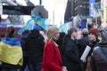 A woman cries at a Rally to Support Ukraine