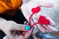 Woman crocheting. Hand craft work using crochet hook. Knitting heart