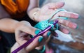 Woman crocheting. Hand craft work using crochet hook. Knitting rug