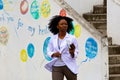 Woman crossing the street in St Kitts, Caribbean