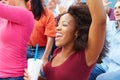 Woman In Crowd Celebrating At Sports Event Royalty Free Stock Photo