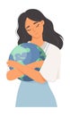 Woman cuddling planet earth globe portrait