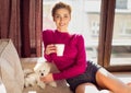 Woman with a cup of coffee