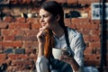 woman with a cup of coffee Near the table waiter service work professionals Royalty Free Stock Photo