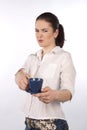 Woman with a cup is disgusted Royalty Free Stock Photo