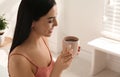 Woman with cup of tea. Lazy morning Royalty Free Stock Photo