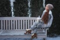 Woman with cup of tea in a park Royalty Free Stock Photo