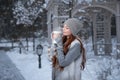 Woman with cup of tea in a park Royalty Free Stock Photo