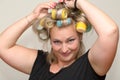 Woman with curler