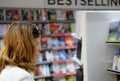 Member of there public seen looking at books as seen in a high-street newsagent and bookshop. Royalty Free Stock Photo