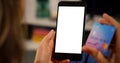 Woman Customer hands holding Credit Card and Smartphone with White Screen.