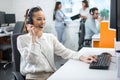 Woman customer service worker, call center smiling operator with phone headset working in office Royalty Free Stock Photo