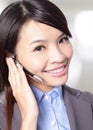 Woman customer support operator with headset