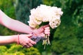 Woman cut a bouquet of flowers white hydrangeas Royalty Free Stock Photo