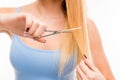 Woman cut her hair. Problem of split ends Royalty Free Stock Photo