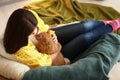 Woman with cute cat resting at home Royalty Free Stock Photo