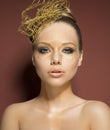 Woman with cute golden make-up Royalty Free Stock Photo