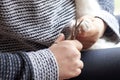 A woman cuts the claws of a cat with nail scissors, pet care Royalty Free Stock Photo