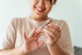 Woman cutting fingernails using nail clipper, Healthcare, Beauty Concept